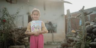 School child with book