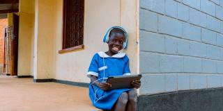 Malawi child learning with an educational tablet