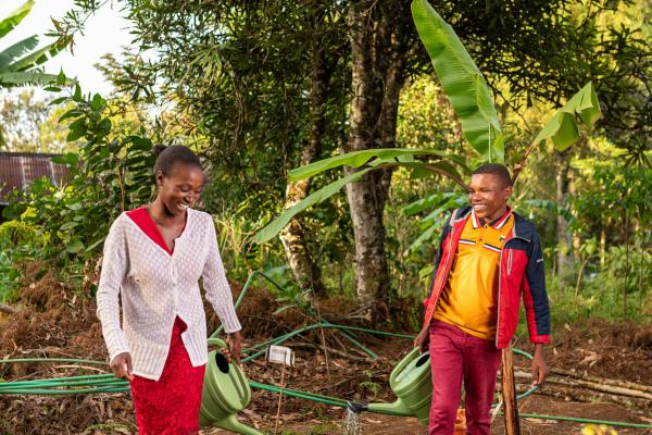 Youth water their crops