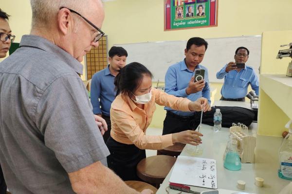 Sean working with Biology staff at the school.