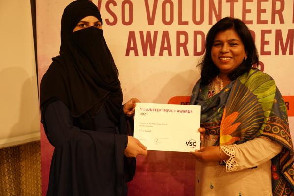 Salma with certificate