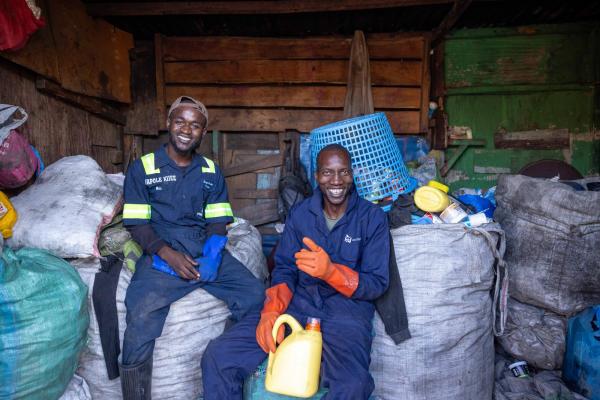 Smiling waste workers