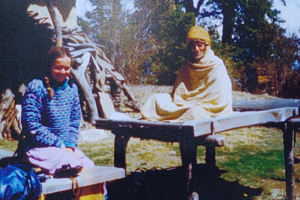 Anne sits with holy man 1980s