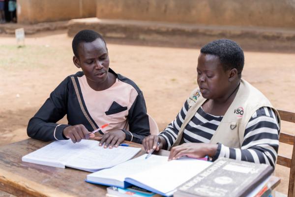 Samuel and Semmy doing lesson planning together.