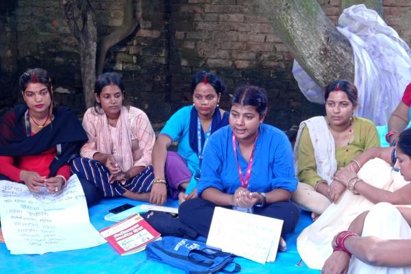Women sitting in a group in conversation in Nepal
